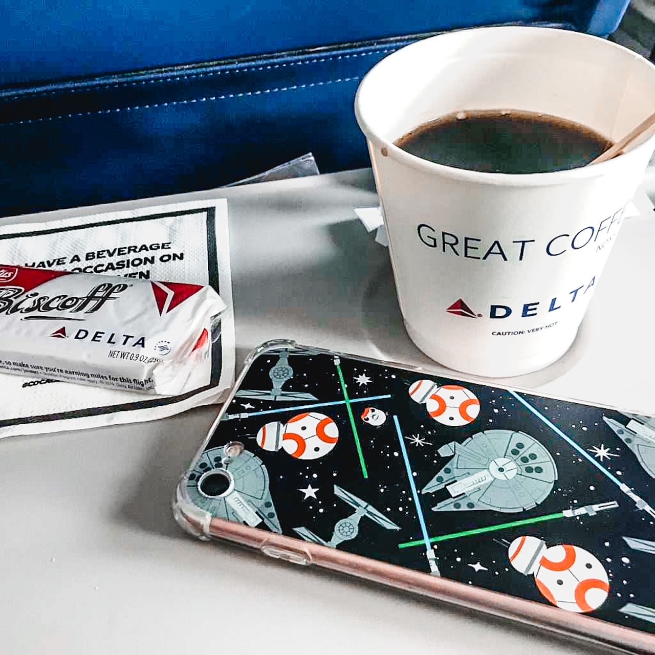 Airplane Table with coffee and phone case